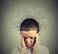 Sad boy with worried stressed face expression looking down Royalty Free Stock Photo