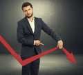 Sad broker holding graph Royalty Free Stock Photo