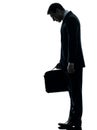 Sad business man looking down silhouette Royalty Free Stock Photo