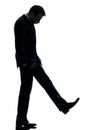 Sad business man looking down silhouette Royalty Free Stock Photo