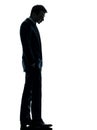 Sad business man looking down silhouette Royalty Free Stock Photo