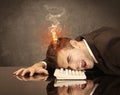 Sad business person`s head catching fire Royalty Free Stock Photo