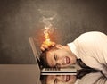 Sad business person`s head catching fire Royalty Free Stock Photo