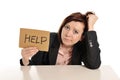 Sad business red haired woman in stress at work asking for help Royalty Free Stock Photo