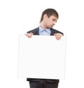 Sad businessman holding a white blank Royalty Free Stock Photo