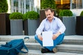 Sad businessman sitting on the steps Royalty Free Stock Photo