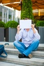 Sad businessman sitting on the steps Royalty Free Stock Photo