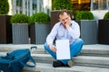 Sad businessman sitting on the steps Royalty Free Stock Photo