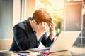 Sad businessman stressed and worried sitting in office. Stress and worry concept. Vintage tone Royalty Free Stock Photo