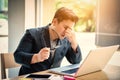 Sad businessman stressed and worried sitting in office. Stress and worry concept. Vintage tone Royalty Free Stock Photo