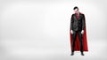 A sad businessman in a superhero red cape standing on white background with his shoulders slumped. Royalty Free Stock Photo