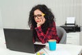 Sad busy office woman working at laptop computer in the office. Overworked businesswoman Royalty Free Stock Photo