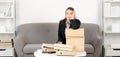 Sad busy secretary with folders with the documents, stressed overworked business woman too much work, office problem Royalty Free Stock Photo