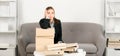 Sad busy secretary with folders with the documents, stressed overworked business woman too much work, office problem Royalty Free Stock Photo