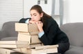 Sad busy secretary, stressed overworked business woman and folders with the documents too much work, office problem Royalty Free Stock Photo
