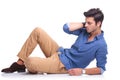 Sad casual man lying down Royalty Free Stock Photo