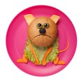 Sad cat made of bread, cheese and vegetables on pink plate Royalty Free Stock Photo