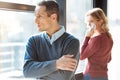 Sad cheerless man standing cross handed Royalty Free Stock Photo