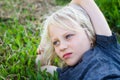 Sad child alone in park Royalty Free Stock Photo