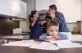 Sad child suffering and parents having discussion Royalty Free Stock Photo