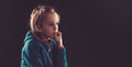 Sad child thinking about his problems. Emotional child portrait. Nervously kid bits his fingernail. Bad kids habit Royalty Free Stock Photo