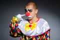 Sad clown against Royalty Free Stock Photo