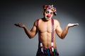 Sad clown against Royalty Free Stock Photo