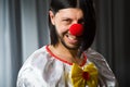 Sad clown against Royalty Free Stock Photo