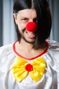 Sad clown against Royalty Free Stock Photo