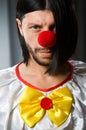 Sad clown against Royalty Free Stock Photo