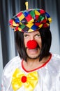 Sad clown against Royalty Free Stock Photo