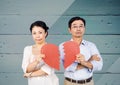 Sad couple holding broken heart Royalty Free Stock Photo