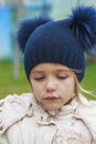 Sad crying offended girl cold autumn outdoor. Concept of upset child Royalty Free Stock Photo