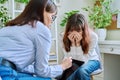 Sad, crying teenage girl at session in office of mental professional Royalty Free Stock Photo