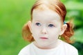 Sad curly little girl Royalty Free Stock Photo