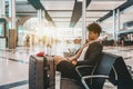 Black young girl waiting her flight in airport Royalty Free Stock Photo