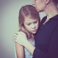 Sad daughter hugging his mother Royalty Free Stock Photo