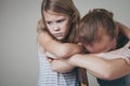 Sad daughter hugging his mother at home. Royalty Free Stock Photo