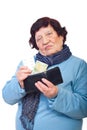 Sad elderly give last penny on medicines Royalty Free Stock Photo