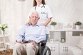 Sad elderly man on wheelchair Royalty Free Stock Photo