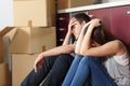 Sad evicted couple worried moving house