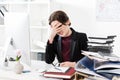 Sad exhausted businesswoman touching forehead at table Royalty Free Stock Photo