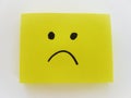 Sad expression. Simple yellow note