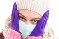 Sad face of cold woman wearing medical sterile mask