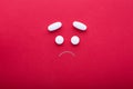 Sad face made of pills Royalty Free Stock Photo