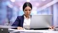 Sad female employee looking at documents on table, overwork exhaustion, stress