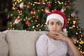 Sad frustrated Indian girl feeling lonely, depressed on Christmas eve Royalty Free Stock Photo