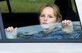 Sad girl in car Royalty Free Stock Photo