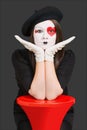 Sad girl with clown mask Royalty Free Stock Photo
