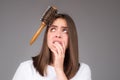 Sad girl with damaged hair. Haircare problem. Woman with hair loss problem. Portrait of young woman with a damaged bad Royalty Free Stock Photo